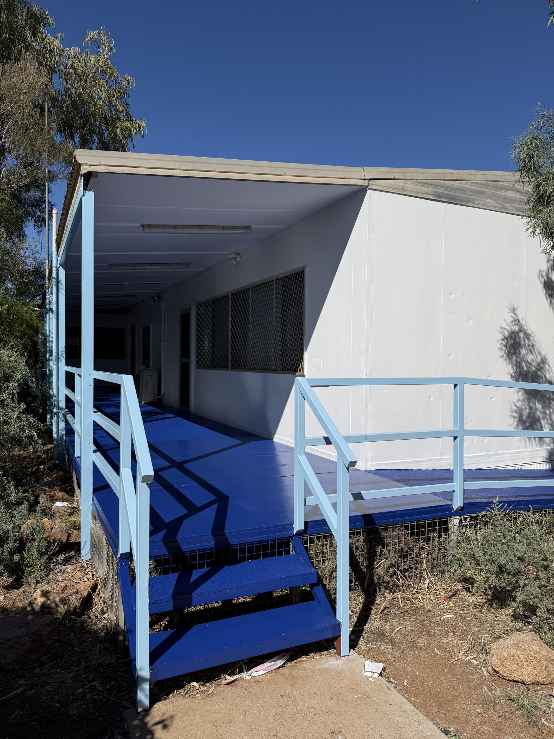 Exterior painting at Alcoota School, Engawala NT